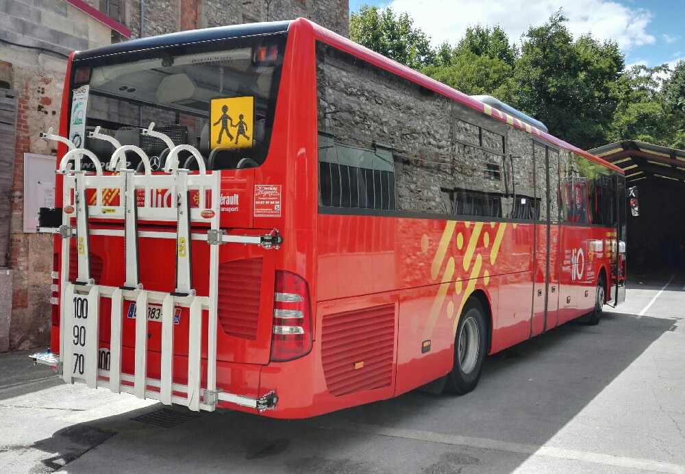 Car et vélo ligne 682 Lio Hérault Transport - © Restouble Voyages